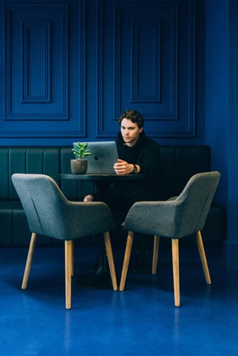 a man waits where he wants to wait with Qless technology
