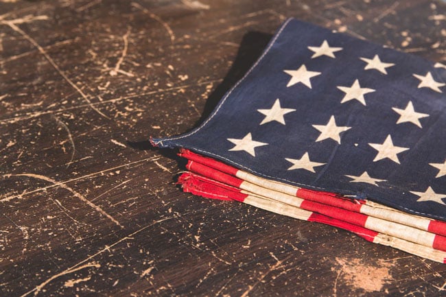an American flag is folded on a table