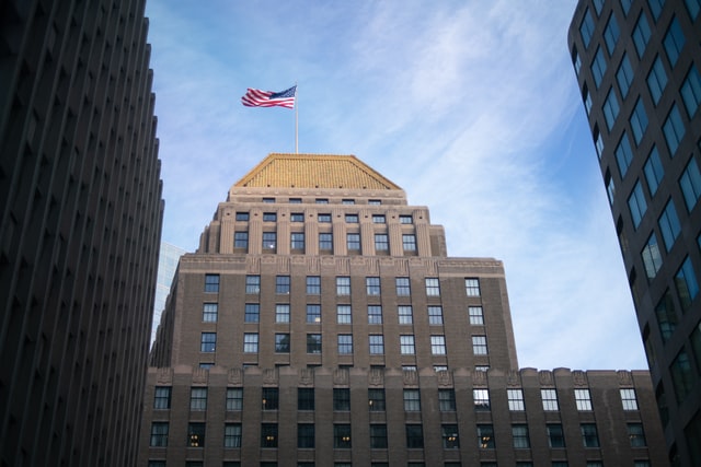 Flag flying outside over a government building