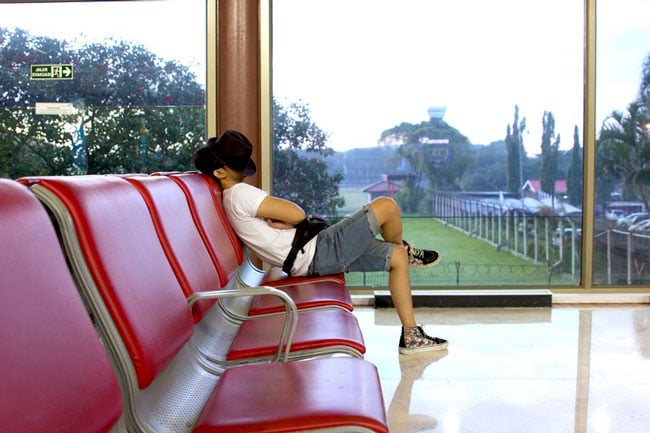 man sits in an empty waiting room