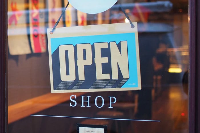 open-sign-store-window