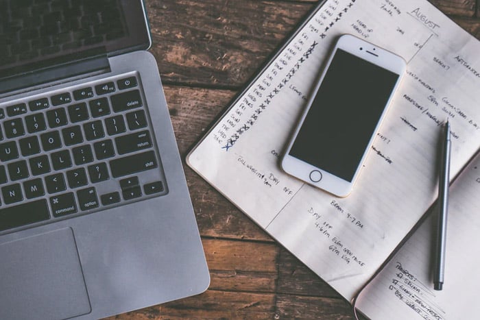 phone-laptop-notepaper