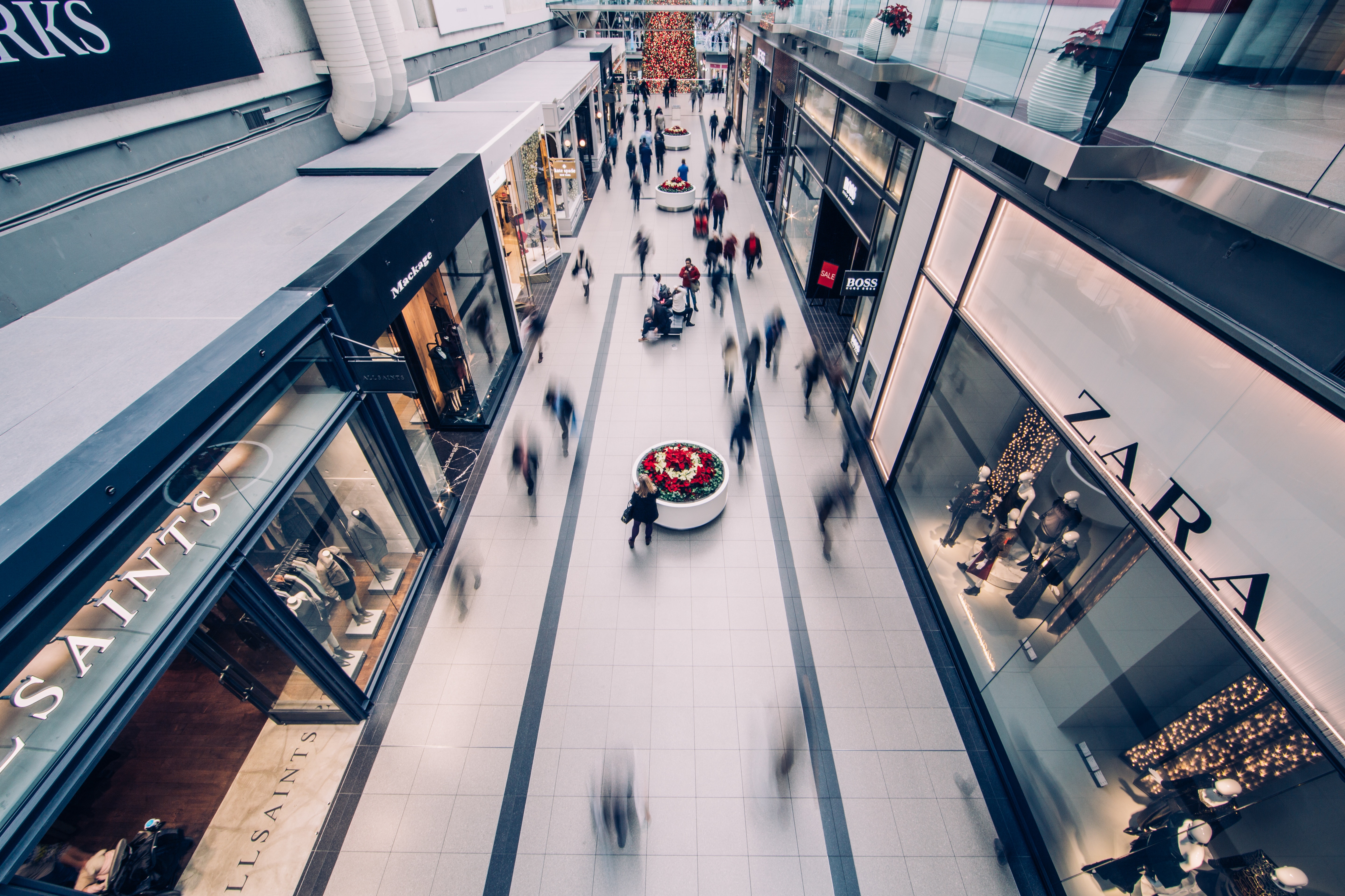 Shoppers in a mall free from waiting in queue